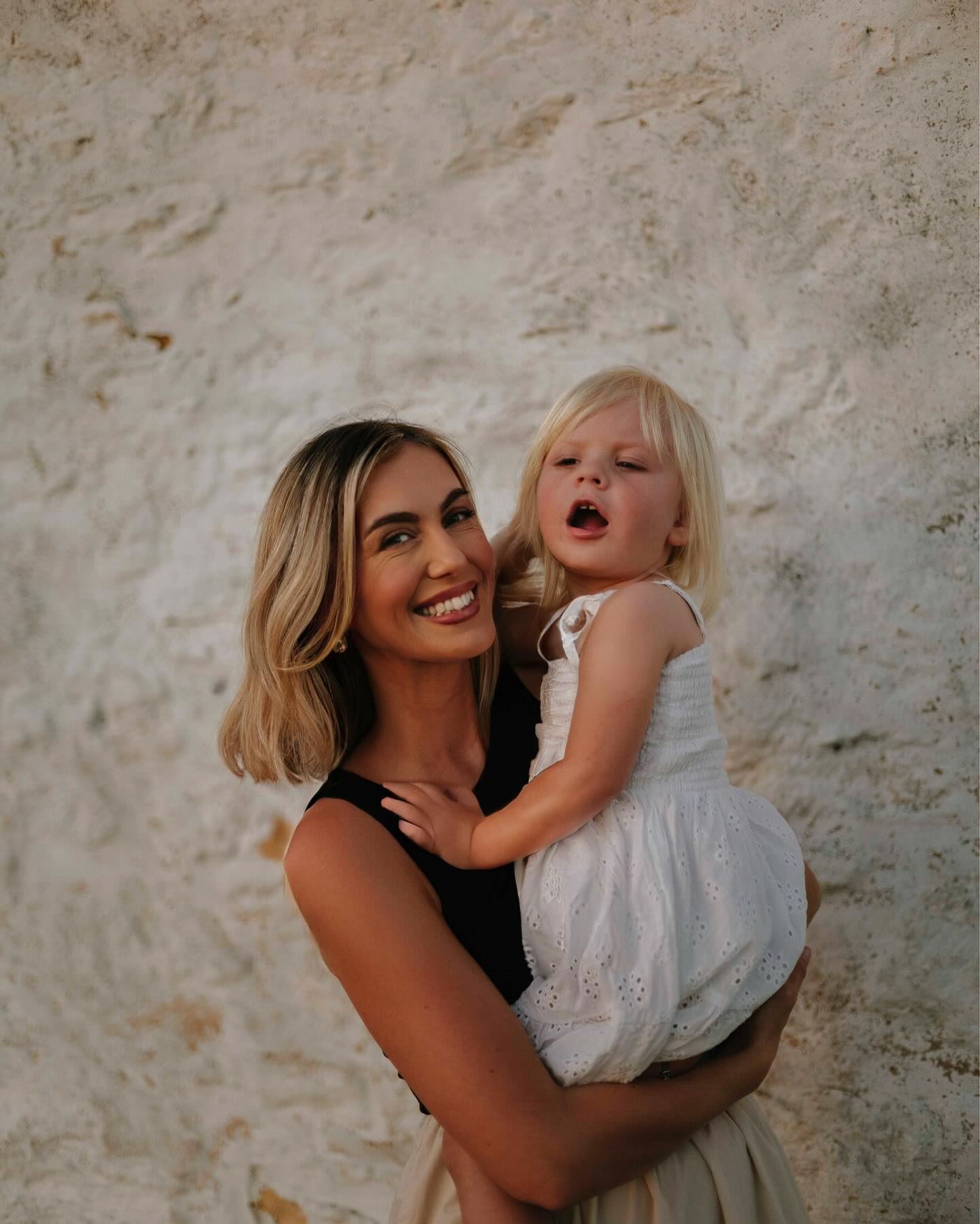 George, founder of Dora Health & Wellbeing, with her daughter Thea